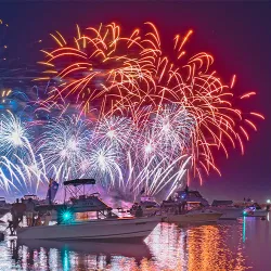 Australia Day fireworks over boats on Sydney Harbour
