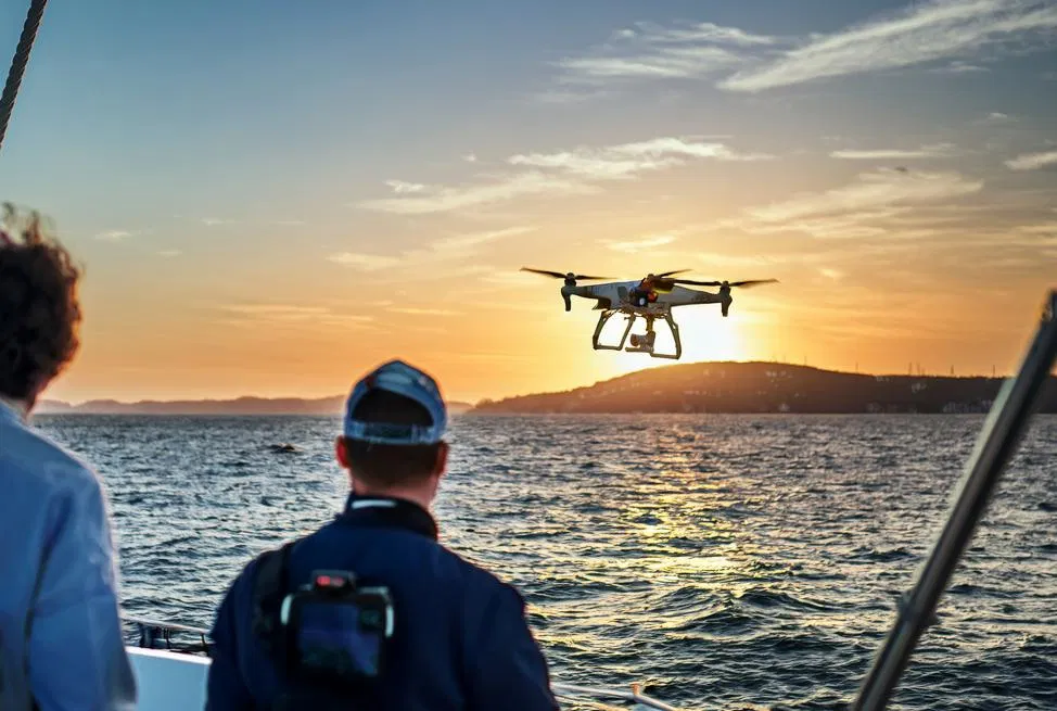Camera drone launching from the deck of a Majestic water taxi on Sydney Harbour