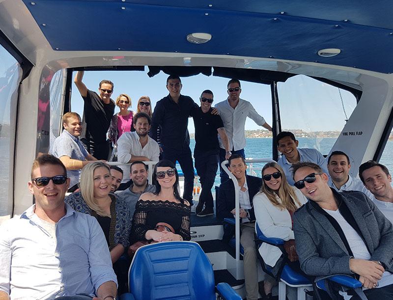 Private group seated in the cabin of a Majestic water taxi